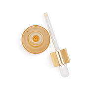 An aerial view of a bottle of Farmacy Honey Grail Hydrating Face Oil