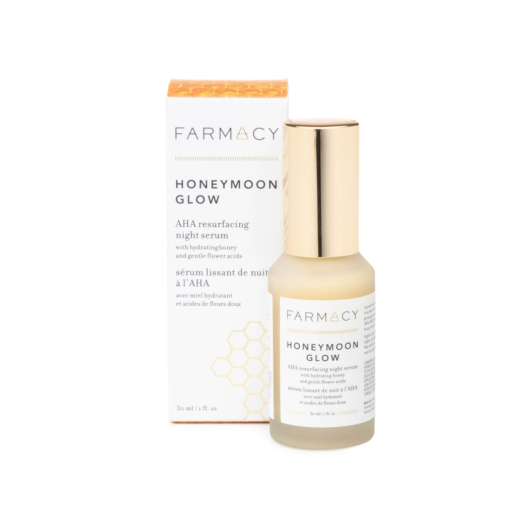 A box and bottle of Farmacy's Honeymoon Glow AHA Resurfacing Night Serum